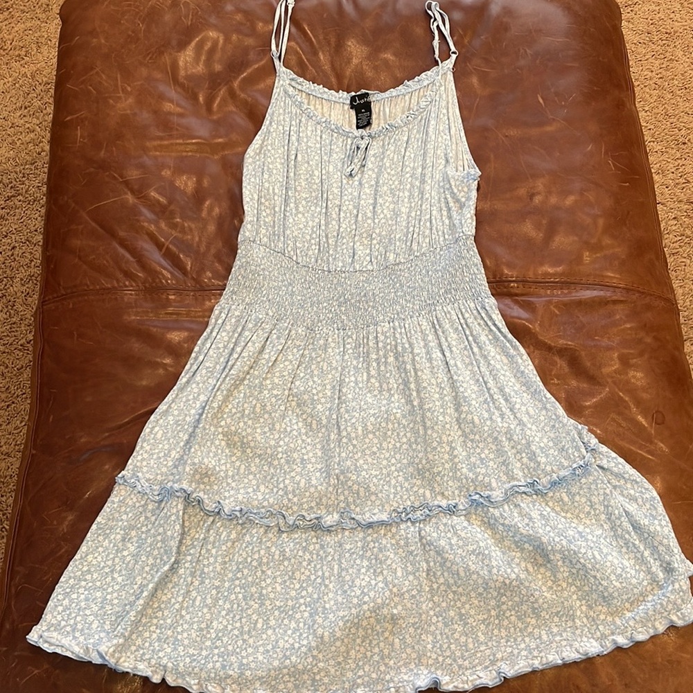 I am selling a blue and white floral mini dress from Justify!